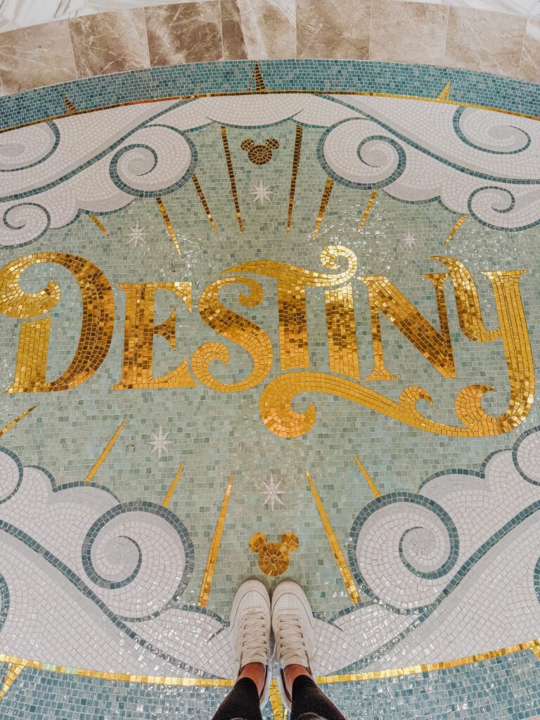 Disney Destiny turquoise and gold mosaic tiled floor