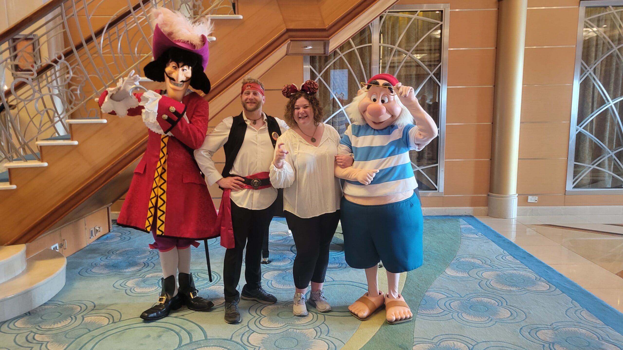 Disney Travel Planner Teresa with Captain Hook, Smee, and a Pirate