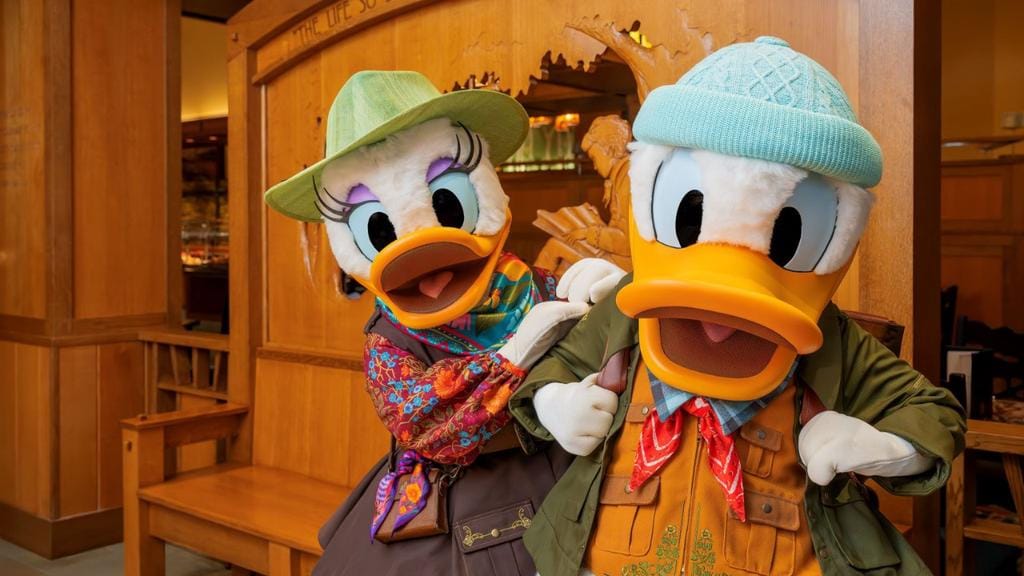donald and daisy in new costumes for character dining