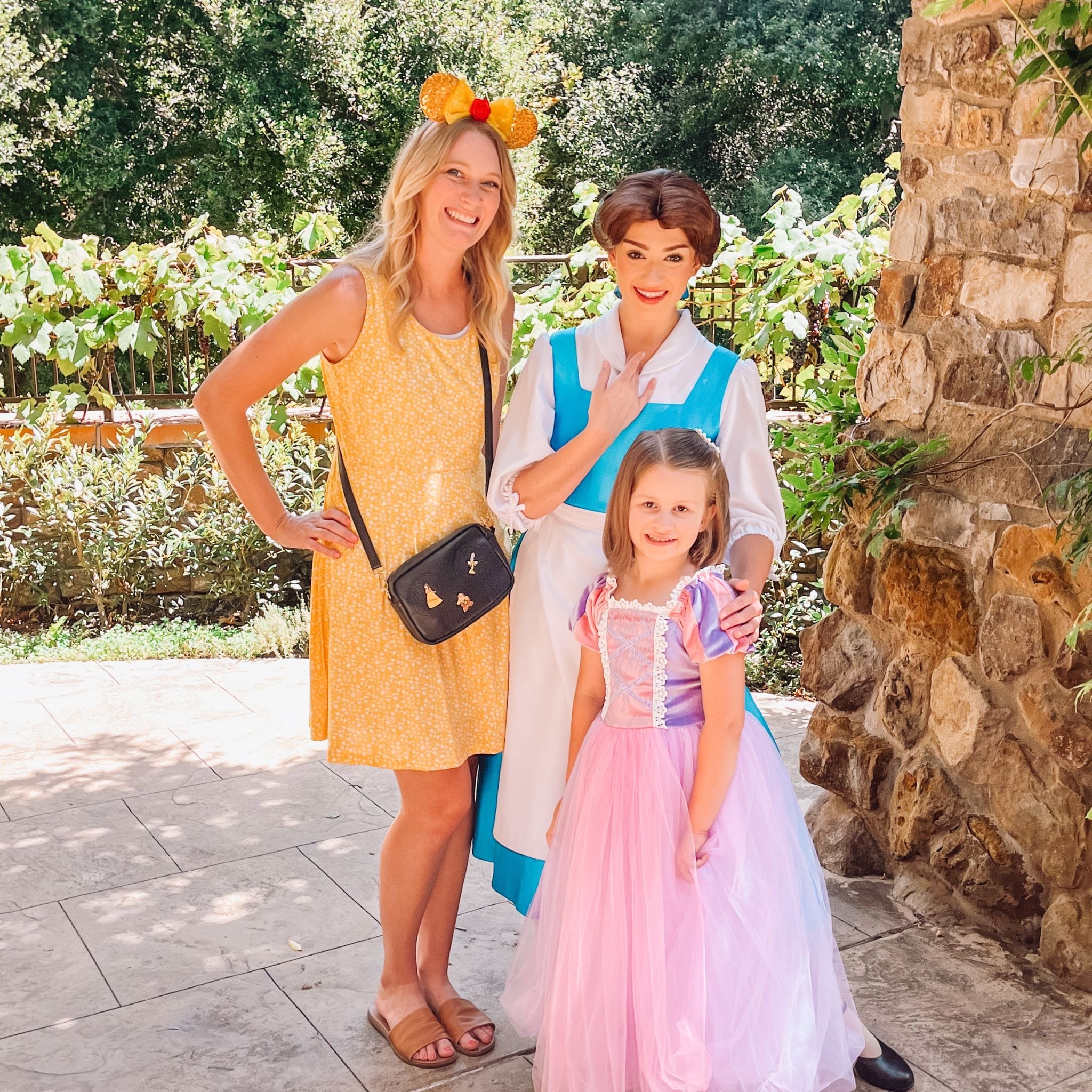 Brittany ConciEARS Disney Travel Planner and her daughter meeting Belle at a Disney character breakfast