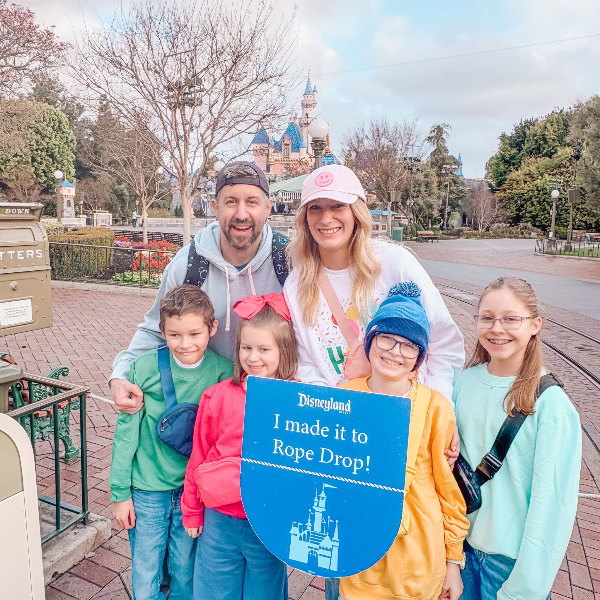 Brittany ConciEARS Disney Travel Planner, her husband, and their four children at Disneyland